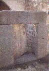 Heavy basalt door Umm Qays Museum